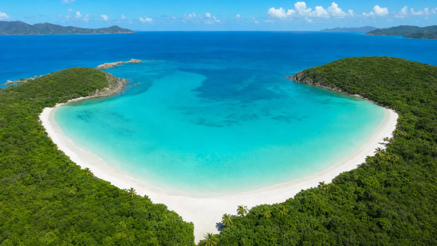 Aerial view of the heart-shaped Magens Bay beach and turquoise water on St. Thomas, US Virgin Islands