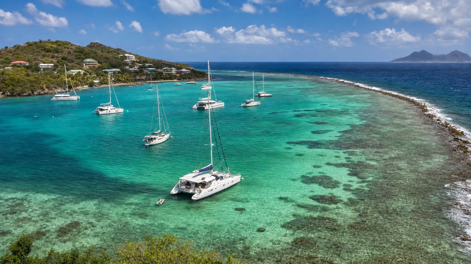 Yachts anchored inside the reef at Clifton Harbour, Union Island