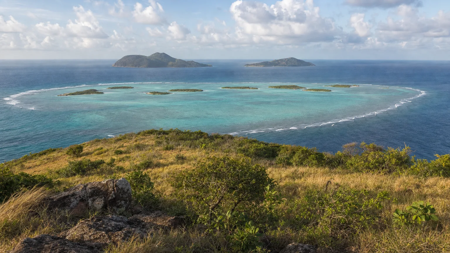 Hilltop view above Salt Whistle Bay, Mayreau island, over the Grenadines toward Union Island