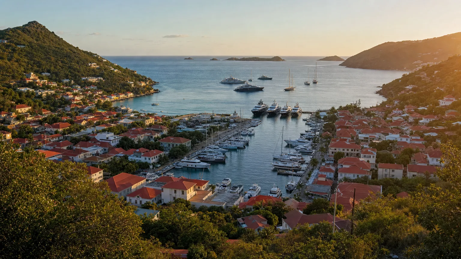 Yachts moored along the quays and anchored outside Gustavia harbour in St. Barts
