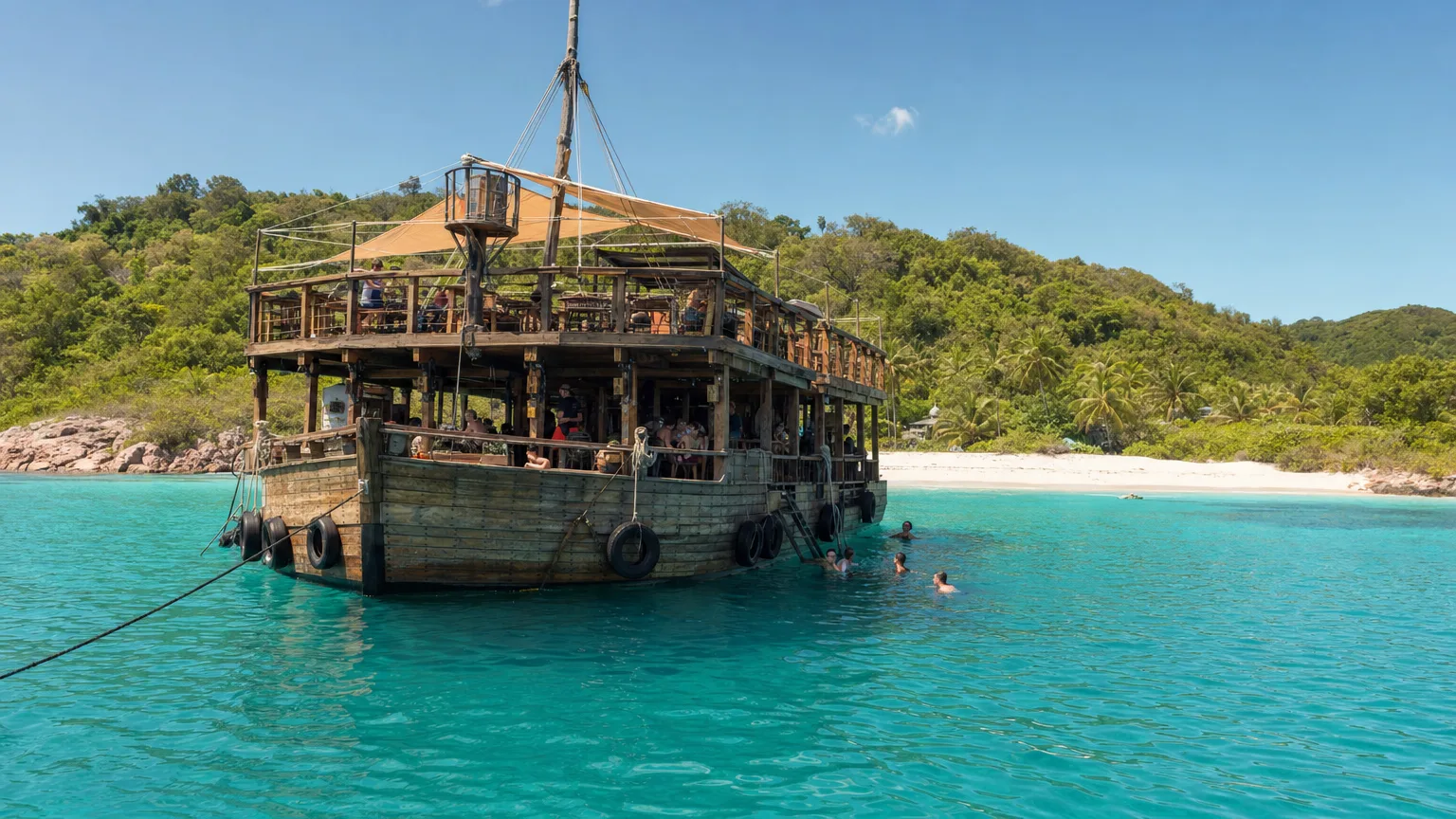 The Willy T floating bar anchored in The Bight off Norman Island in the British Virgin Islands