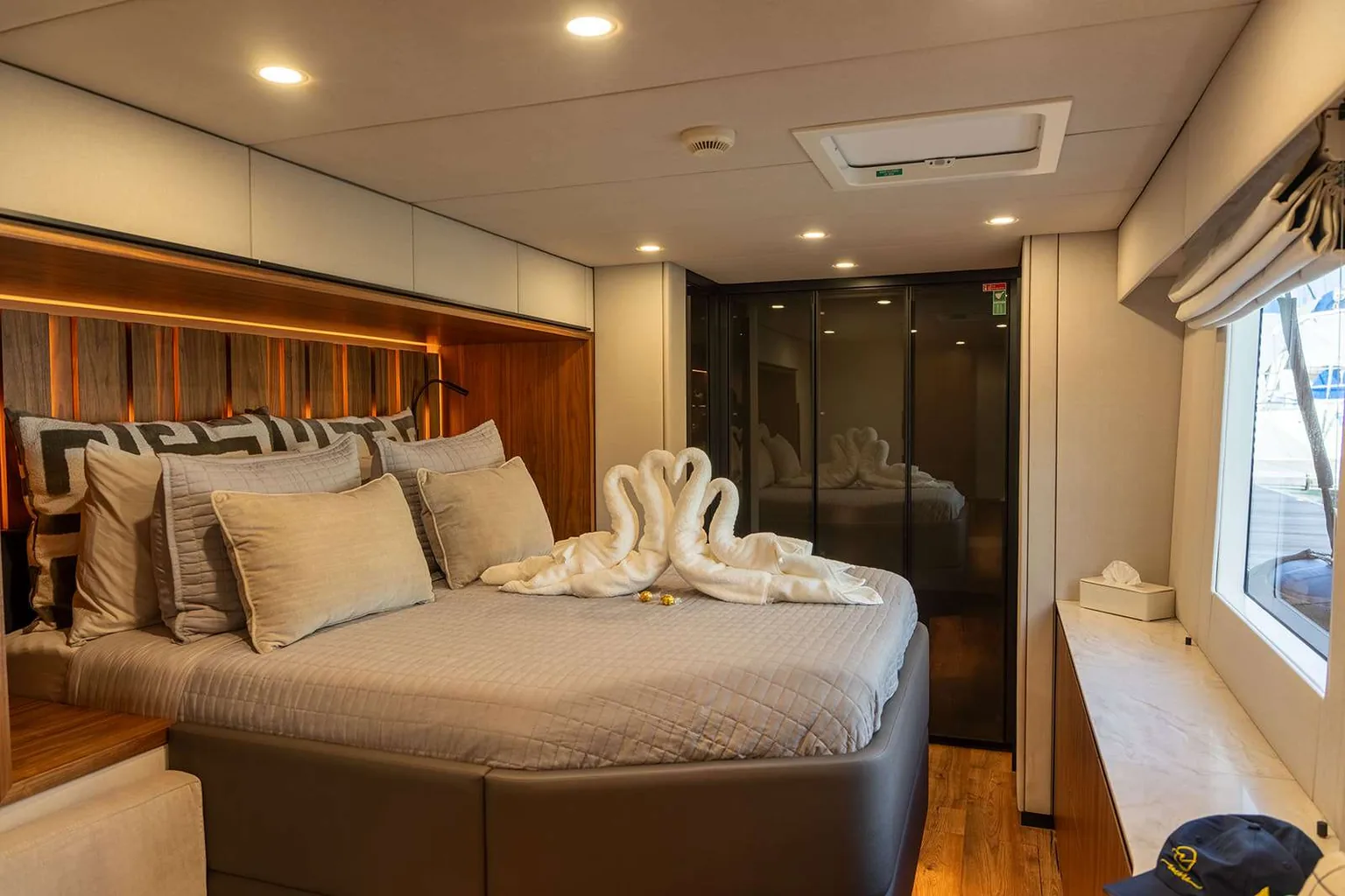 Master cabin aboard the Sunreef 60 Encore with king bed and ensuite bathroom