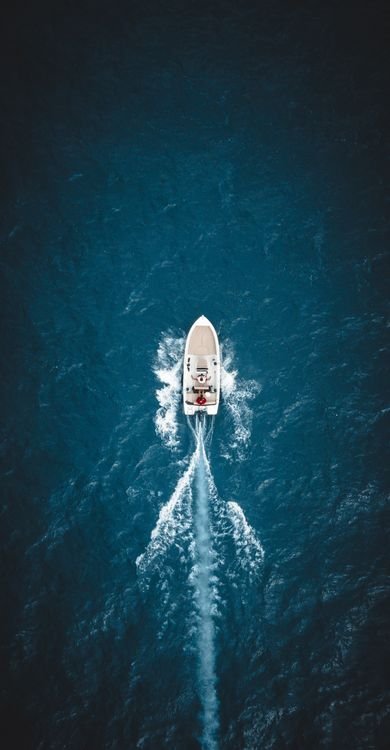 Sailing yacht under way in turquoise Caribbean water on a crewed charter week