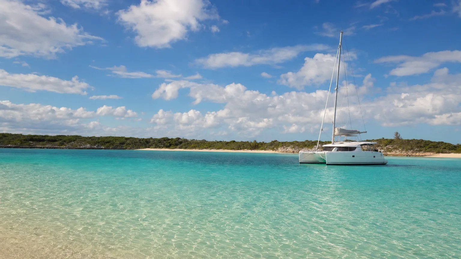 Crewed catamaran anchored in the Exumas, where Bahamas entry needs six months of passport validity