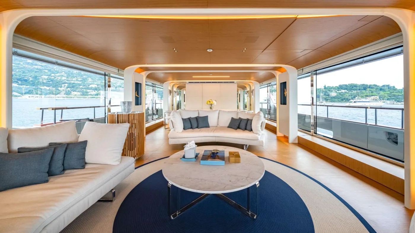 Delivered in 2023, ALLURIA&rsquo;s contemporary interior, light-flooded rooms, and modern features are inspired by the glamorous Motopanfilo yachts built over 50 years ago. Accommodating 10 overnight guests in five cabins, she has a multitude of communal spaces and amenities to appeal to a mixed charter group or families alike.

One of her many highlights is the &rsquo;cocoon-style&rsquo; observation deck that provides an intimate space to enjoy a morning coffee or evening sundowner while taking in sweeping views. The spacious Hamptons-style beach club invites guests to relax in the sun at sea-level and features a retractable fabric canopy providing ample shade when needed; as well as a platform for easy access when enjoying one of the yacht&rsquo;s broad selection of water toys. Her foredeck outdoor pool lounge is yet another exterior space to soak up the sun, with plush sun pads and a large swimming pool.

ALLURIA&rsquo;s floor-to-ceiling windows, clever use of mirrors, and open-plan interior create an environment that is bright, sophisticated, and connected with the surrounding ocean. The main salon features wide-spanning windows, allowing guests to take in the incredible panoramic views even indoors, socializing on her comfortable sofa, sipping a cocktail by the cylindrical bar cabinet or enjoying a sunset dinner in her formal dining area. She provides seamless flow from the interior main salon to the main deck aft. Each of the cabins are well-appointed. The vast full-beam, on deck master suite is designed with natural light from the surrounding panoramic windows. It also features a private seating space that can be used as an office, a vanity and a generous en suite bathroom. Her four additional guest cabins are well-appointed and ideal for families, mixed groups and couples.
