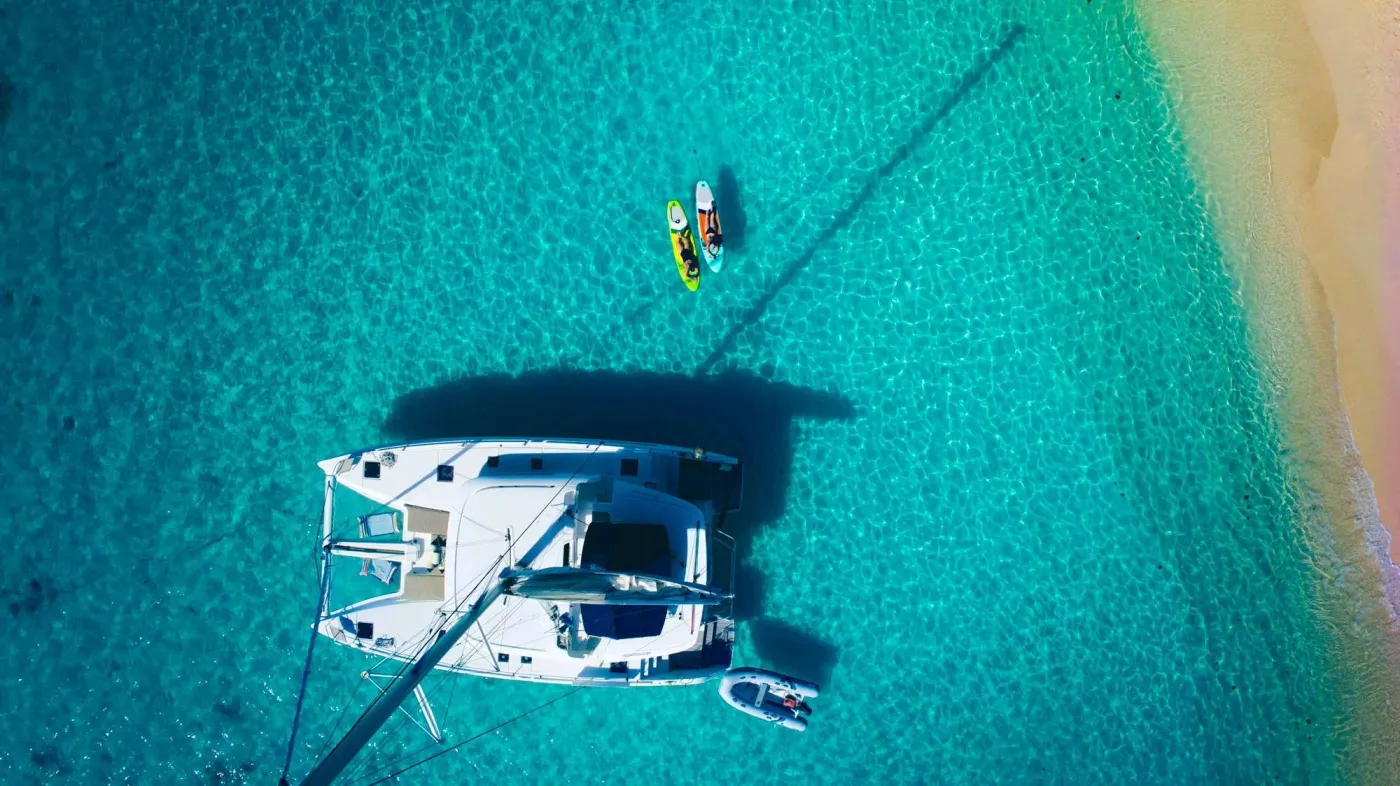 <p>Anchored just off the beach and enjoying the paddle boards</p>