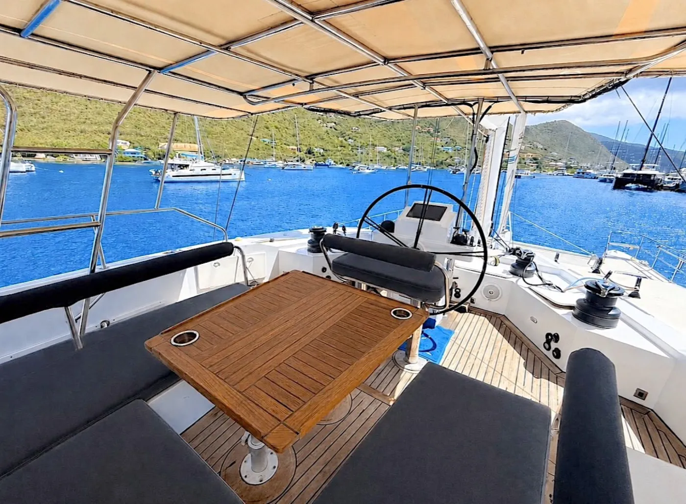 <p>The helm and flybridge seating area</p>