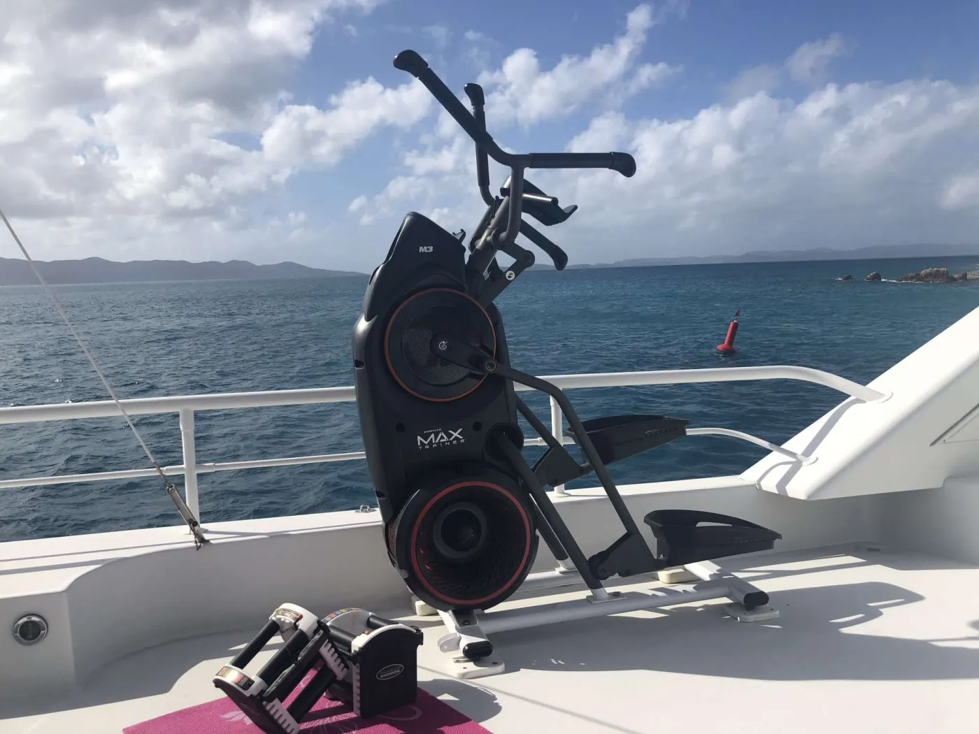 Workout area includes Elliptical Bow Flex and Free Weights 8 thru 50#