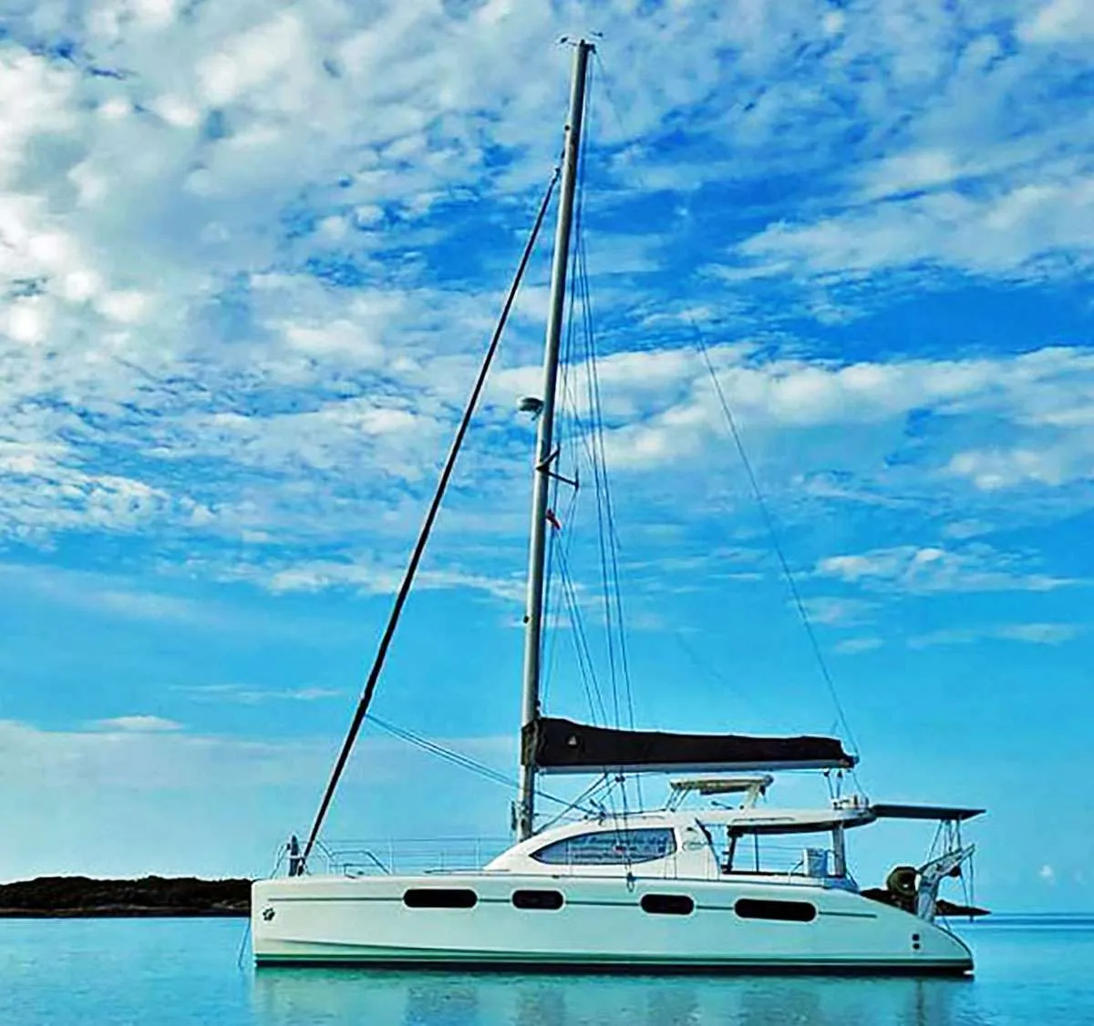 Getaway to Ft. Lauderdale, the Florida Keys, The Bahamas, or anywhere in between, on this lovely Leopard 46', The Space Between. An ideal size for a family or couples, this sailing catamaran sleeps up to 6 passengers in 3 Queen, En-suite cabins. Each cabin is equipped with full shower, head, and great storage cupboards.
The deck space and living areas also create plenty of areas to lounge, dine, and take in the scenery. The unique cockpit table with map of the cruising region is always fun to check out as your journey to these beautiful destinations.
