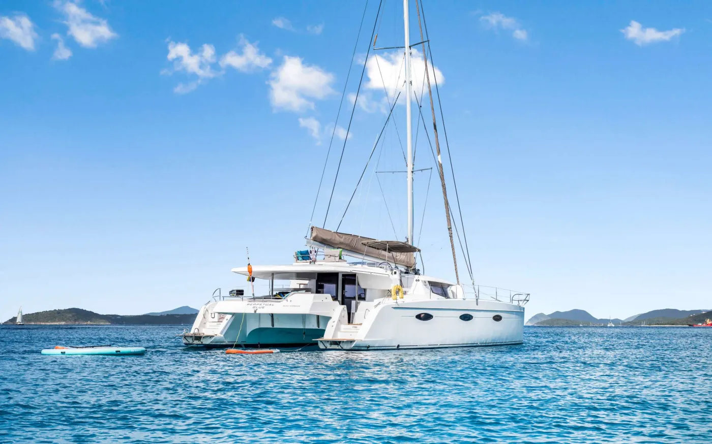 PERPETUAL BLUE is a refreshed 59&rsquo; Fountaine Pajot sailing catamaran, revitalized from 2022&ndash;2025 to deliver boutique-hotel polish with the freedom of a true sailing escape. Sleeps up to 8 in 4 queen cabins&mdash;each with a private ensuite&mdash;so everyone gets comfort and privacy. Bright interiors, smart ventilation, and full A/C keep the salon and cabins cool and breezy, while the outdoor living is made for Caribbean days: relaxed alfresco dining, an inviting aft lounge, and elevated top-deck seating for cocktails, reading, and endless views. Highlights include upgraded systems for smoother, quieter cruising&mdash;improved engines, water system, and steering&mdash;so the experience feels effortless from bow to stern. Refreshed, refined, and ready to roam&mdash;PERPETUAL BLUE is island calm with serious capability.