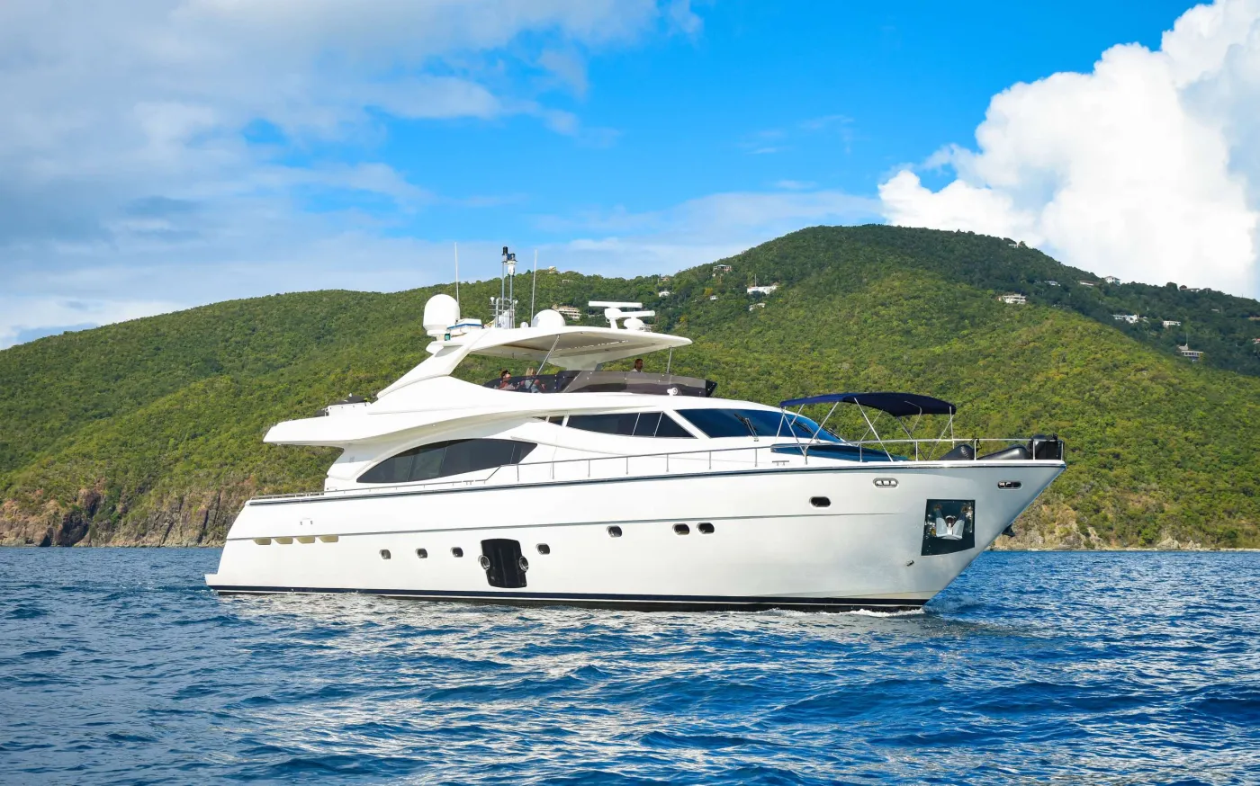 INDULGE II is a 2006 motor yacht with a 2022 refit, built for high-energy island-hopping and easy luxury. Sleeps up to 10 in 4 cabins: 1 Master, 1 VIP, and 2 Twin cabins; for groups of 10, 2 guests must be children under 12. The top deck hot tub is the showstopper—perfect after a saltwater day—while the oversized bow pad with bimini delivers front-row views in shaded comfort. Adventure comes standard with a full lineup of water-toy fun plus a powerful tender for fast beach runs and towable thrills, and there are also e-bikes for exploring ashore. Spacious, playful, and made for unforgettable memories—INDULGE II keeps the itinerary spicy and the vibes smooth.