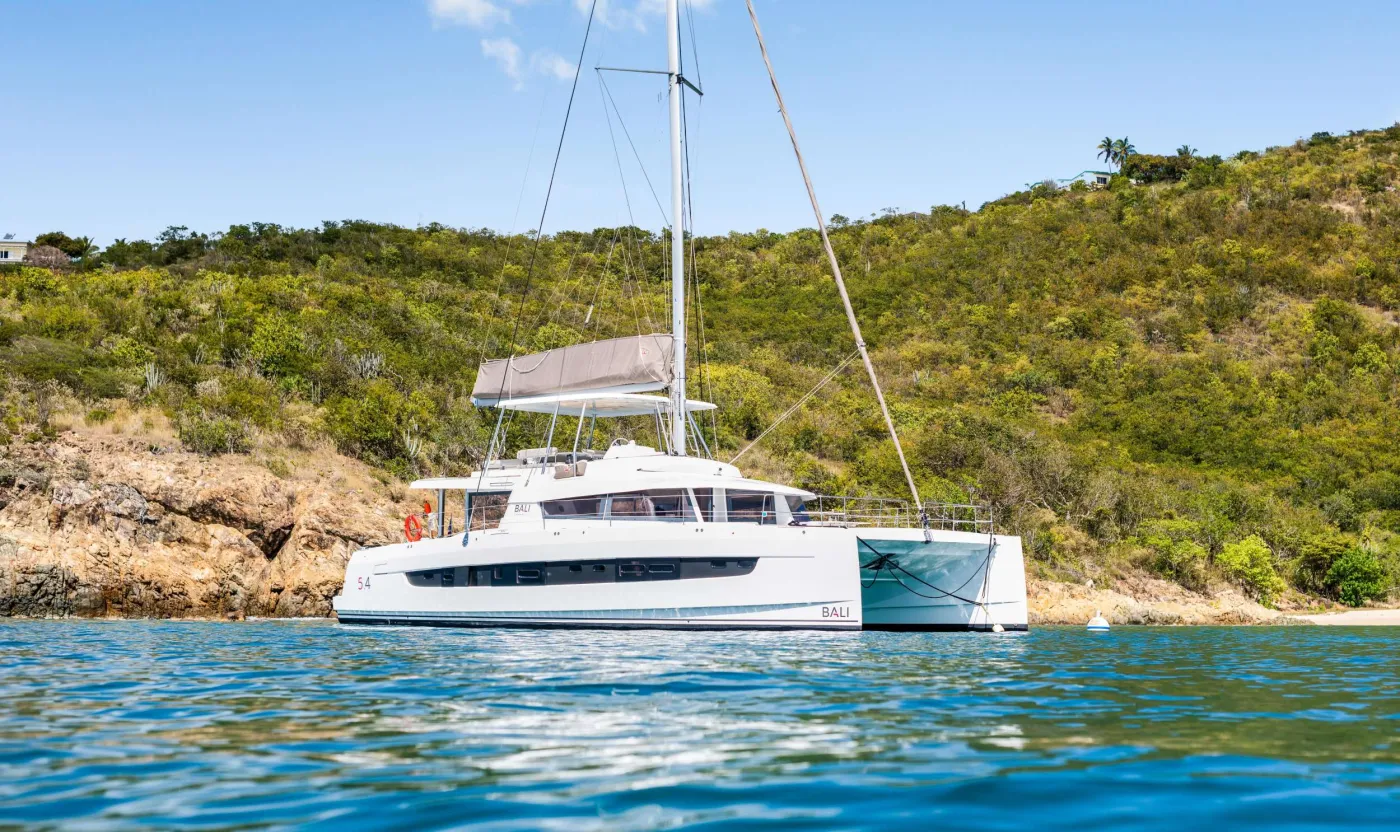 C SISTERS is a 2023 BALI sailing catamaran designed to feel wide-open, bright, and beautifully social from the moment you step aboard. The standout: BALI&rsquo;s signature open-plan living, with a stylish cockpit featuring wood floors, a dining table, and a lounge bench that flows effortlessly into the sunlit salon framed by wraparound windows. Head up to the flybridge for panoramic turquoise-water views and sail-watching from every angle&mdash;perfect for sunset cocktails, light bites, and slow, breezy afternoons with a book. Sleeps up to 8 in 4 Queen cabins, each with a private ensuite bathroom and separate shower, plus generous natural light throughout. Polished finishes and multiple &ldquo;favorite spots&rdquo; make C SISTERS the kind of yacht everyone falls into&mdash;fast.