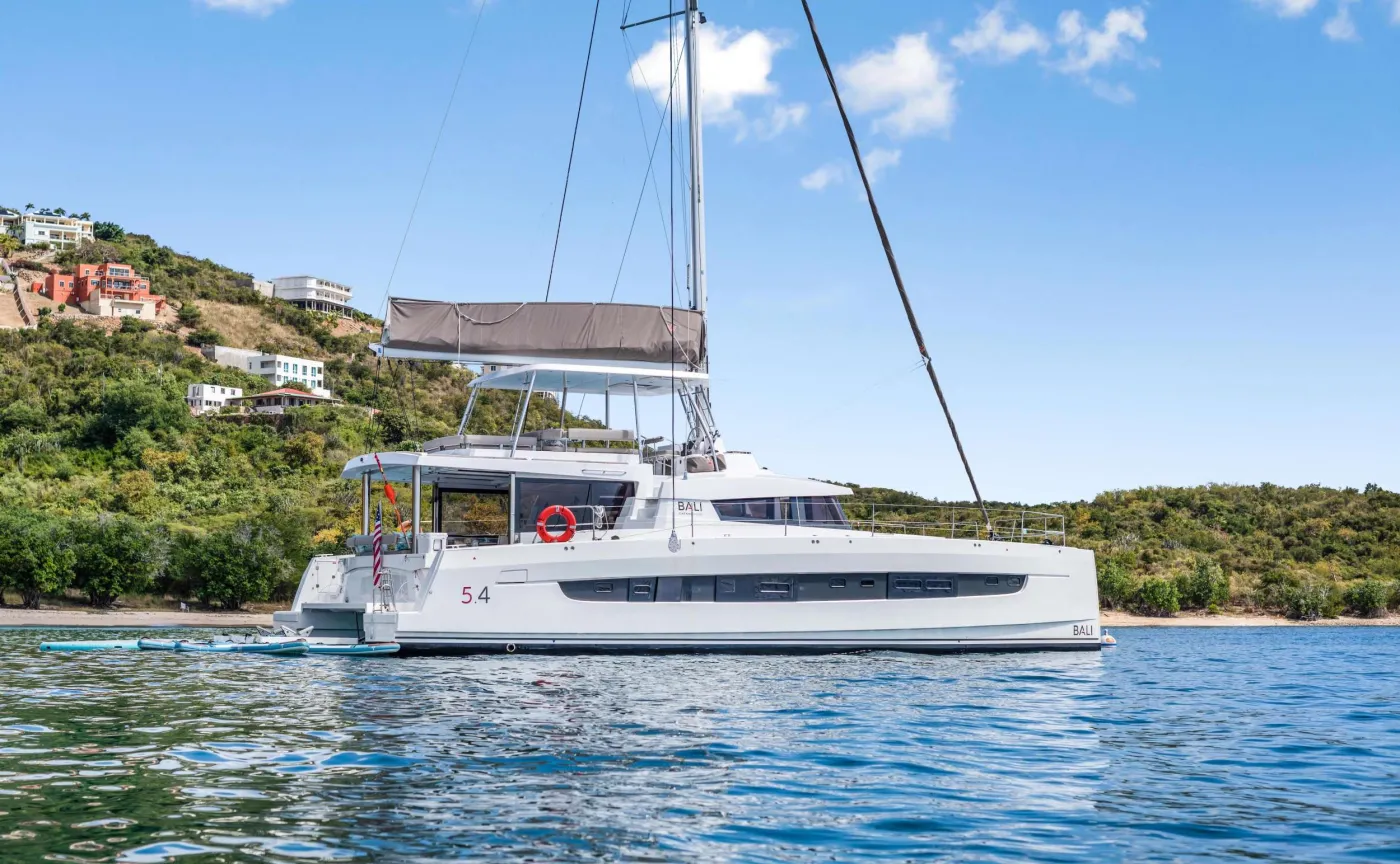 C SISTERS is a 2023 BALI sailing catamaran designed to feel wide-open, bright, and beautifully social from the moment you step aboard. The standout: BALI&rsquo;s signature open-plan living, with a stylish cockpit featuring wood floors, a dining table, and a lounge bench that flows effortlessly into the sunlit salon framed by wraparound windows. Head up to the flybridge for panoramic turquoise-water views and sail-watching from every angle&mdash;perfect for sunset cocktails, light bites, and slow, breezy afternoons with a book. Sleeps up to 8 in 4 Queen cabins, each with a private ensuite bathroom and separate shower, plus generous natural light throughout. Polished finishes and multiple &ldquo;favorite spots&rdquo; make C SISTERS the kind of yacht everyone falls into&mdash;fast.