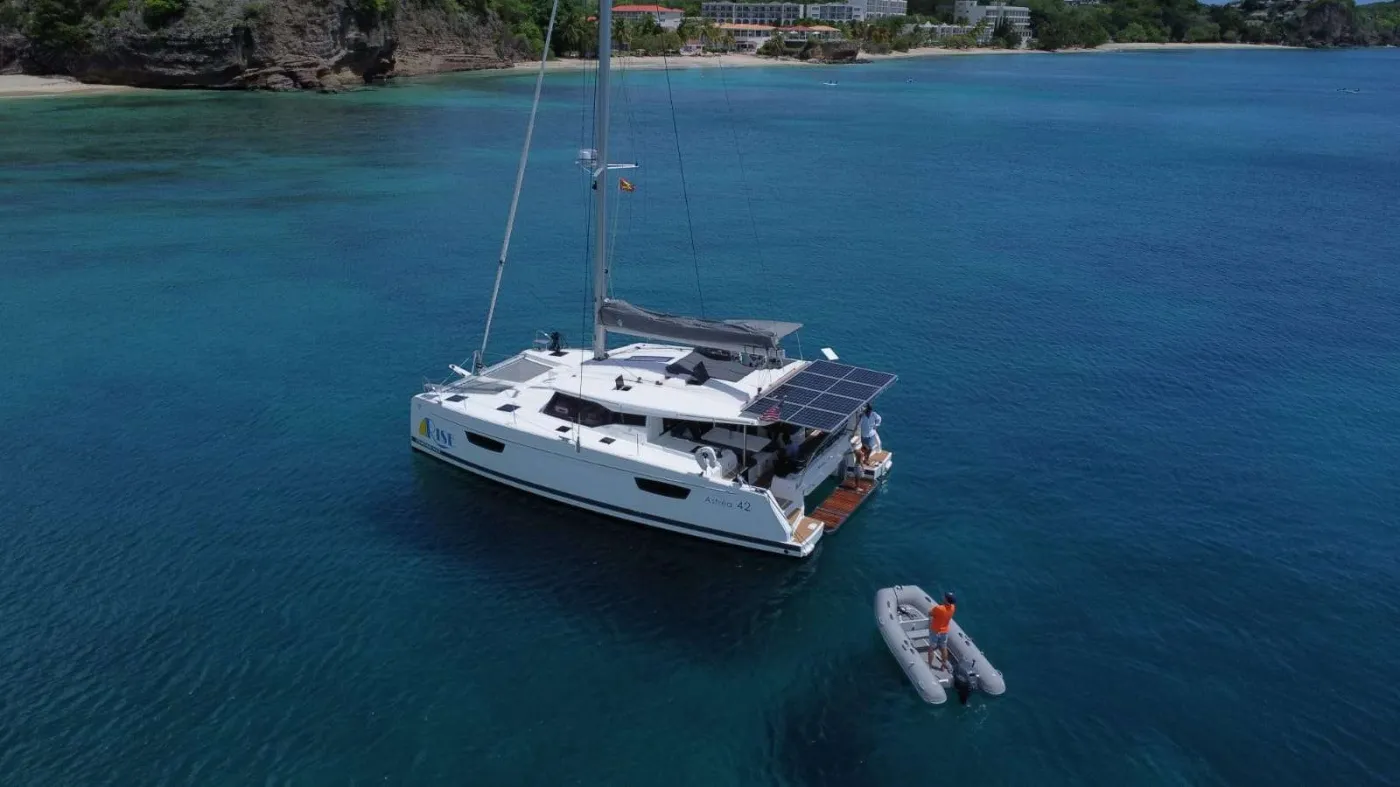 Welcome to "RISE" this superb catamaran from the Fountaine Pajot 42' Astrea range proving to be one of the most popular catamarans in this range with a great combination of comfort, aeshetics and seaworthiness.  The free flowing spaces, from the U shaped galley to the spacious salon area for relaxing, onto the aft deck where guests can enjoy dining in comfort.

The huge owner's suite on the starboard side also has the benefit of an ensuite shower and walk in shower.
The aft double cabin on the port side also has ensuite bathroom facilities.

RISE is based in Grenada the perfect location to explore the Grenadines.

A few of the photos featured in this brochure are subject to copyright of Fountaine Pajot - Gilles Martin-Raget