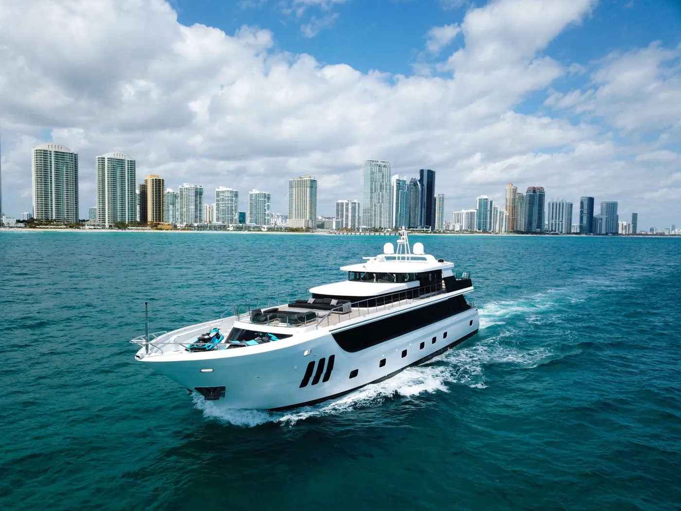 The M/Y PRIVILEGE distinguishes itself with its unmatched utilization of onboard space and innovative design. Crafted by WHS Marine, this bespoke vessel offers owners a seamless luxury cruising experience. Every detail of PRIVILEGE's layout is meticulously crafted to maximize space and seamlessly blend the outdoor experience into the interior.
Featuring a voluminous and breathtaking interior, PRIVILEGE showcases exquisite naval architecture and design that rivals or surpasses that of a 130' yacht. The expansive Salon and Sky lounge provide ample space for relaxation and entertainment, while the Midship lounge transforms into a formal dining area accommodating up to 12 people. The master stateroom steals the spotlight aboard this custom build, offering an exceptional spa-like experience complete with sauna and jacuzzi tub for unwinding after an adventurous day. With four staterooms and five heads, this yacht offers luxurious entertaining areas where the expansive windows capture mesmerizing sunsets and sunrises, enveloping you and your guests in the beauty of nature.
Her forward bow boasts ample space for sunbathing, and after an exhilarating day on the water guests can indulge in the aft jacuzzi, enhancing the experience of relaxation. PRIVILEGE is perfect for families, groups of friends, or corporate occasions and events alike. An exciting addition to the charter market, she is sure to delight all those who step on board.