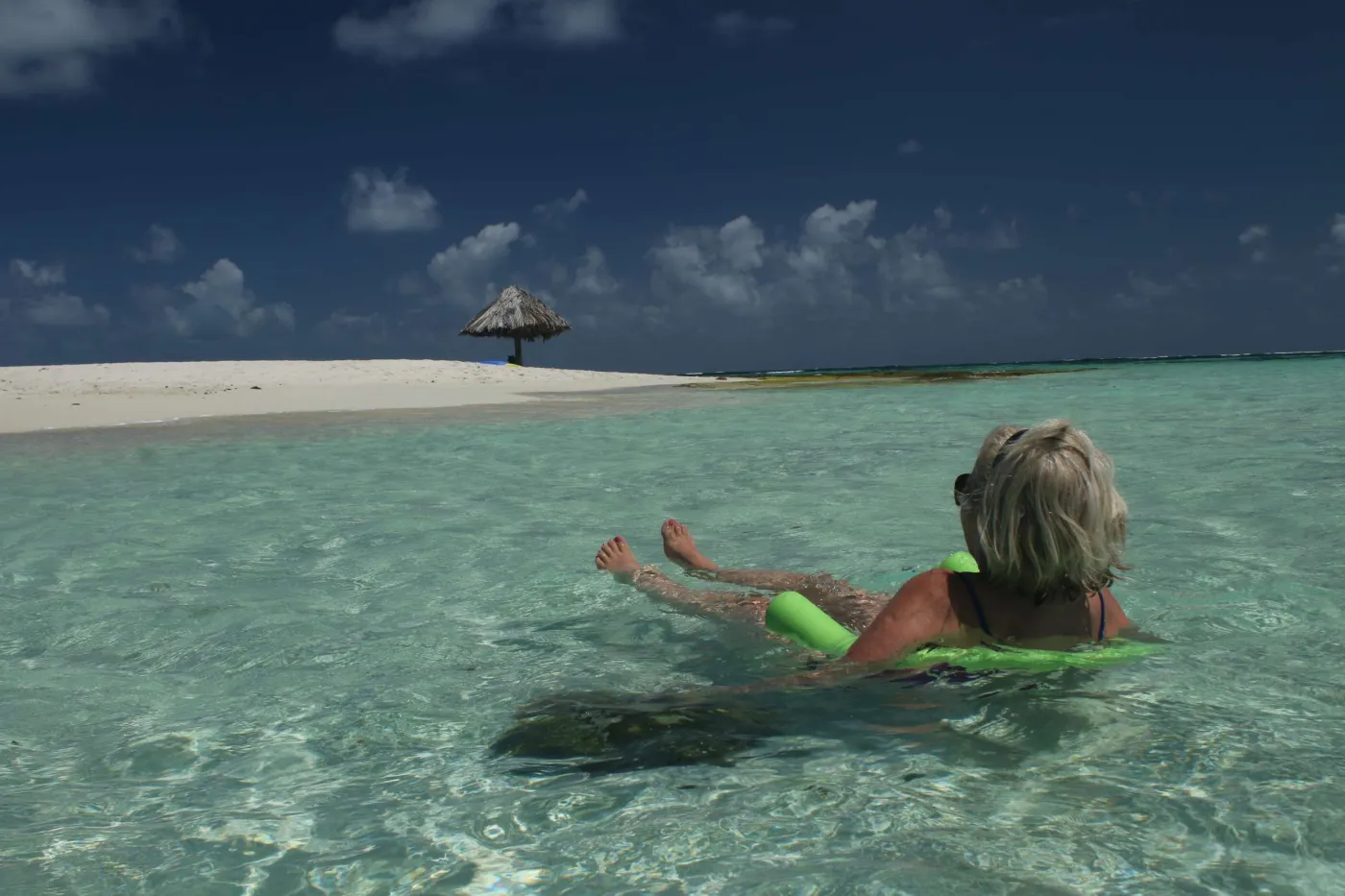 <p>GENESIS guest floating off beach</p>