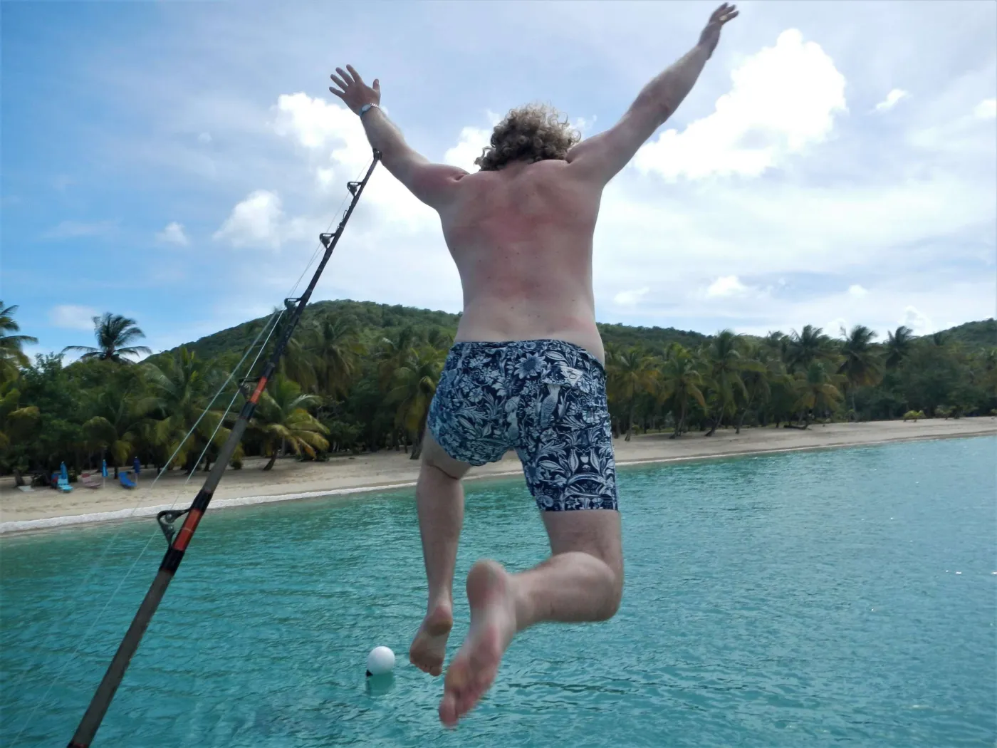 <p>GENESIS guest jumping in water</p>